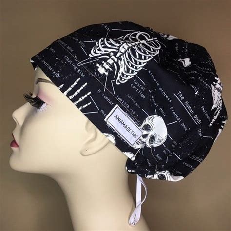 That's why we handcraft metabolically appropriate food for dogs: Black and white bones scrub hat. Print depicts human bones ...