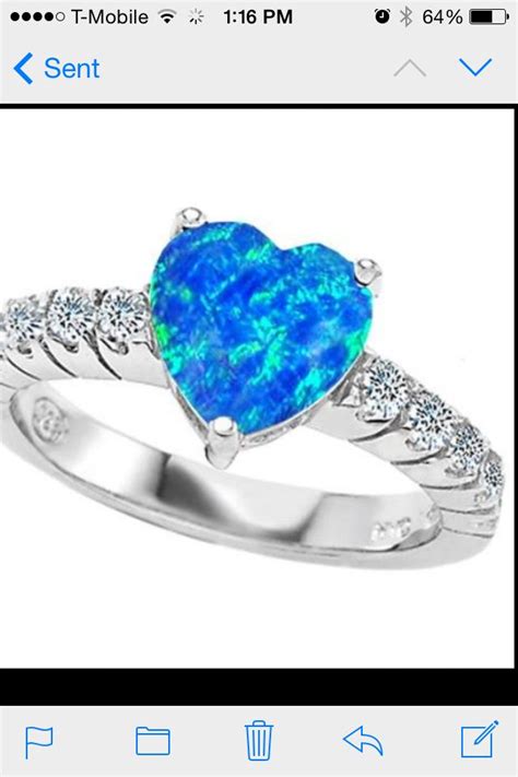 Statement blue opal diamond rings are also offered, which are sure to up the style quotient of any outfit and help you look your best. blue opal | Blue engagement ring, Blue opal ring, Fabulous engagement rings