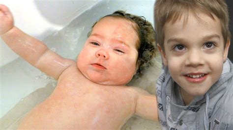 It's best not to bathe your baby straight after a feed or when they're hungry or tired. BABY GETS A BATH BY BIG BROTHER - YouTube