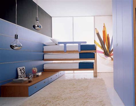 Si può anche pensare a un letto indipendente che possa scorrere. BONETTI CAMERETTE BONETTI BEDROOMS: CAMERETTA CON TRE LETTI