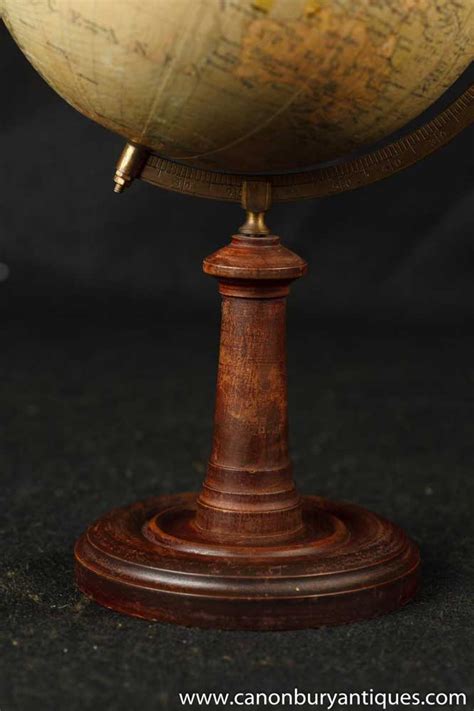 Antique world globe on stand. Antique Swedish World Globe Map on Wooden Stand