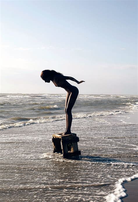 naked woman standing on crate in the sea by Rene de Haan - Ocean, Wave ...