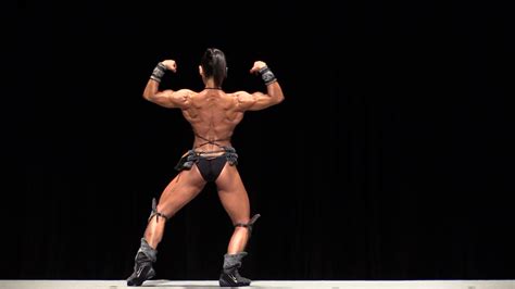Aki showing one baseball sizede bicep. Aki Nishimoto