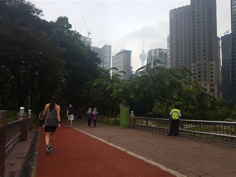 Territory of kuala lumpur, malaysiahow to get there: Running at KLCC Park next to Petronas Twin Tower and KLCC ...