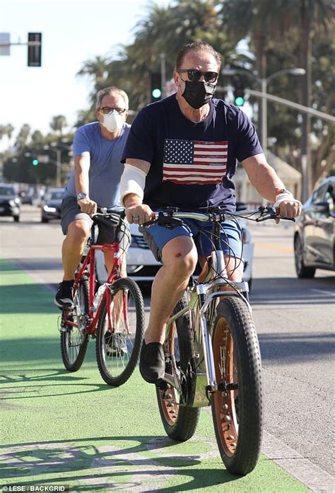 Sign up for my newsletter Arnold Schwarzenegger wears shirt bearing American flag ...