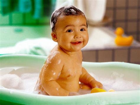 Hypoallergenic softening oil absorbs quickly into your baby's skin. What are the important tips for bathing your baby during ...