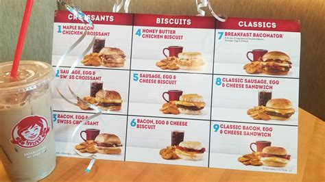 The menu features breakfast sandwiches, including the honey butter chicken sandwich and breakfast baconator. Biscuits, croissants, burritos and more, all on Wendy's ...