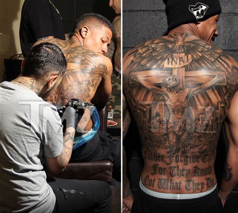 Nick cannon, now has a huge tattoo on his arm which is of a creepy devilish character holding a bloody heart. Nick Cannon -- Wild 'N Out with New MASSIVE Back Tattoo (PHOTOS) | Nick cannon tattoo, Nick ...