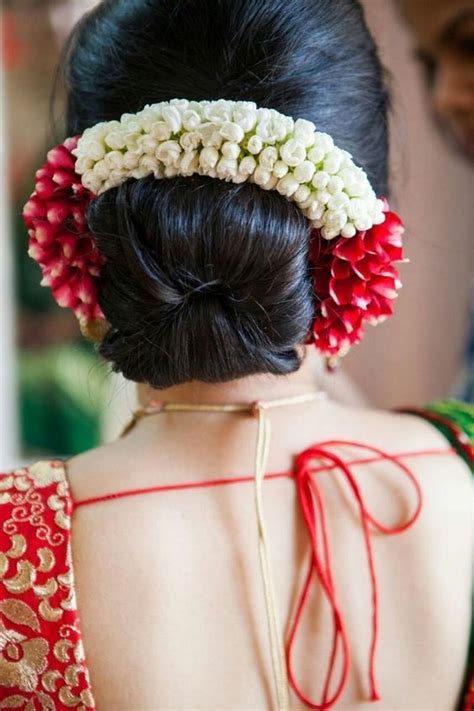 Keep your hair natural or straighten for this thick braided crown and a low bun. 20+ Pretty Asian Wedding Updo Hairstyles Ideas | Indian ...