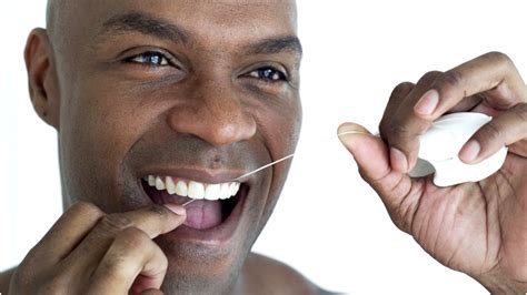 Improve your oral health by using fry's recommended flossing technique with a threader to help remove the excess. Is Flossing Really a Scam? | Adams Dental