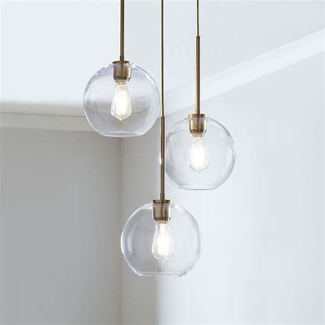 In a range of finishes, it's just the thing to add illuminating intrigue to your hallway, entryway or dining room. Sculptural Glass Globe 3-Light Chandelier - Small | west elm