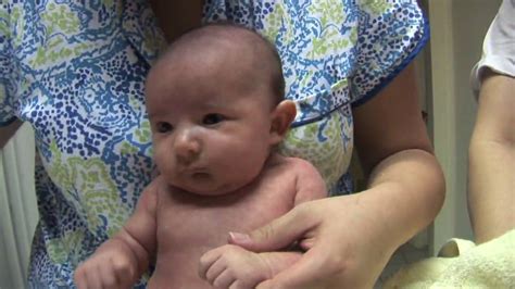 You should use one hand to support the baby's head and neck. 1 month old baby bath for cute baby Elise - YouTube