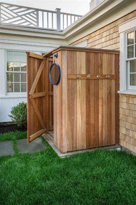 Two rustic wooden stools act as seating and a. Dream Home 2015: Outdoor Shower | Patios, Cedar shakes and ...