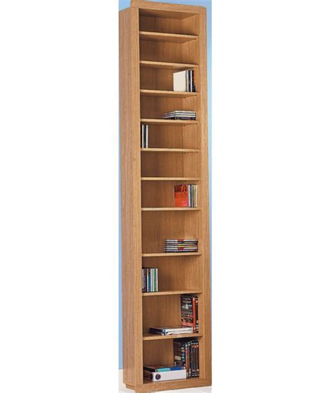 Features double doors, three fixed shelves and one adjustable shelf. Oak effect dvd storage | Media storage tower, Tall cabinet ...