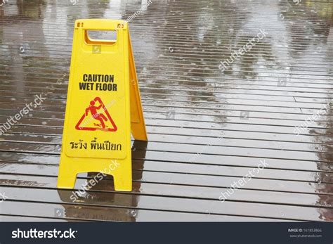 Pagasa rainfall warning alert system color code meaning and rainfall values (in mm). Sign Warning Of A Slipping Due To Rain On A Wooden Floor Stock Photo 161853866 : Shutterstock