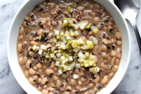 My grandmother use to make them along with pig's feet, cornbread, and potato salad so pour your package of black eyed peas into a big bowl and vigilantly look through them and remove all the bad ones (discolored, split, or smashed). Black-Eyed Peas Recipe | The Hungry Hutch