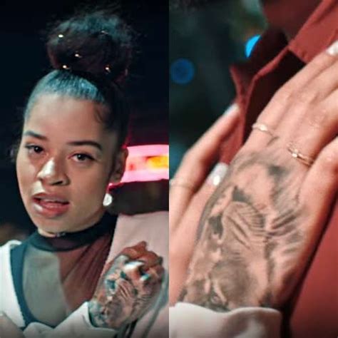 Mea melone opens up her lips. Ella Mai Lion Back of Hand Tattoo | Steal Her Style