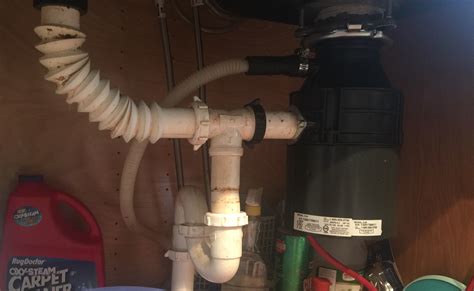 Carefully carry it over to the. One side of kitchen sink not draining | Terry Love ...