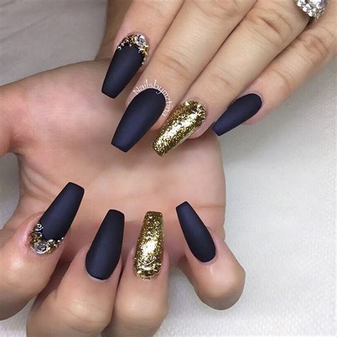 Here is a blue and gold acrylic nail design. Navy & Blue 🌙 @nailsbymztina (With images) | Gold nail designs, Gold nails, Coffin nails designs