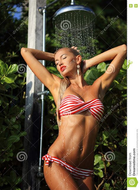 A big battle in the water colosseum!! Blonde Girl Taking A Shower Stock Photo - Image of fresh ...