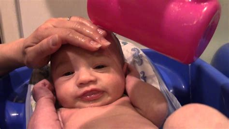 At this point, you can do some sort of sleep training; Baby loves bath time. - YouTube