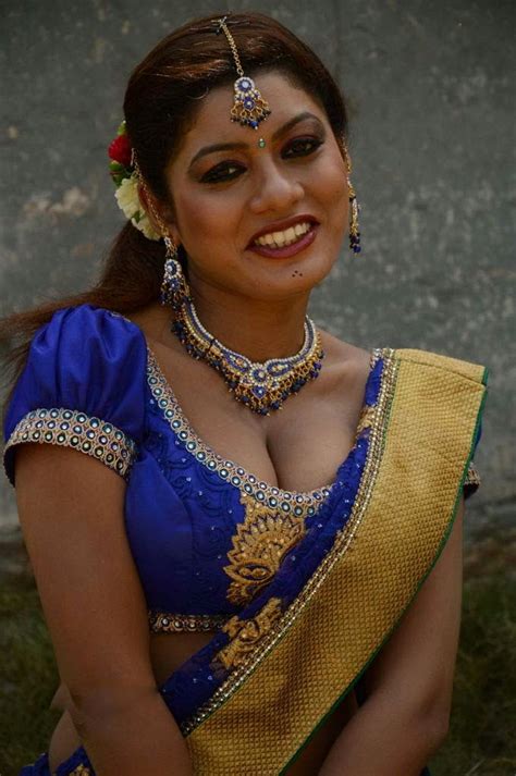 Hot indian milf aunty in hot saree blouse showing deep cleavage and bra strap to fans for money. kerala mallu aunty parvathi sexy saree pallu drop exposing ...