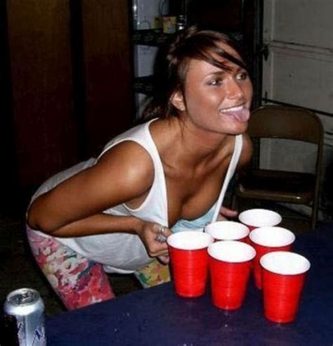 Three young ladies play a strip game of bounce the ball in the hole. Boobs And Beer Pong Are A Great Combination (53 pics)