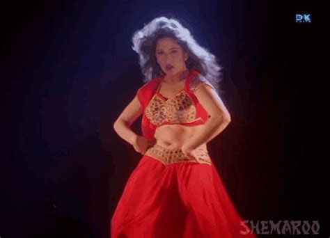 In this movie scene, we can see the actors getting wet in the washroom. Madhuri Dixit tempting navel - Bolly Tube