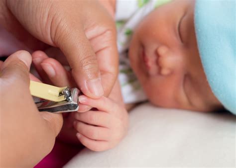 That's what i was originally planning on doing, but our kitchen is so small (we have zero counter space), that it would make me kinda nervous. How do I safely trim my newborn's nails? Here are 4 steps ...