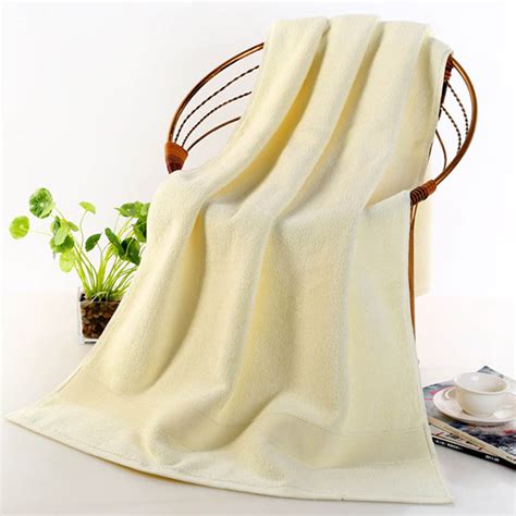 It has a geometric stripe pattern printed and fringe details on each end. Thick Cotton Large Bath Towel