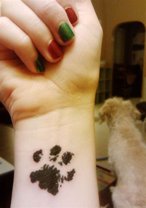 Paw print tattoos may have different meanings depending, on whether you are getting a cat paw. Cat Tattoos - Designs and Ideas | Pawprint tattoo, Paw ...
