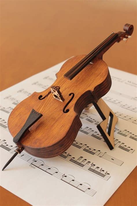 See more ideas about christmas fun, holiday fun, christmas holidays. Cello - miniature musical instrument - present - Christmas ...