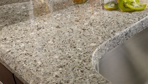 Beige, white, gray, and black. Alpina White | Granite Countertops Seattle