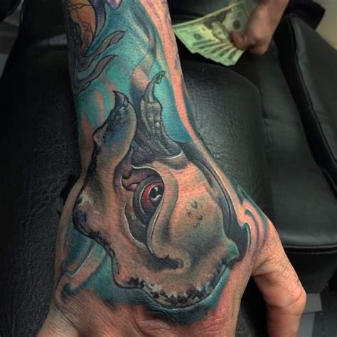 Maybe you would like to learn more about one of these? Small cartoon style colored underwater monster head tattoo ...