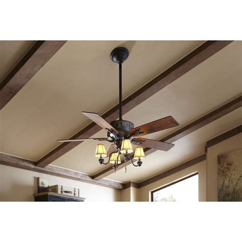 Aspen offers a rustic five bladed ceiling fan with brushed amber glass that is enhanced by weathered bronzed patina. Shop Hunter Adirondack 52-in Brittany Bronze Downrod or ...