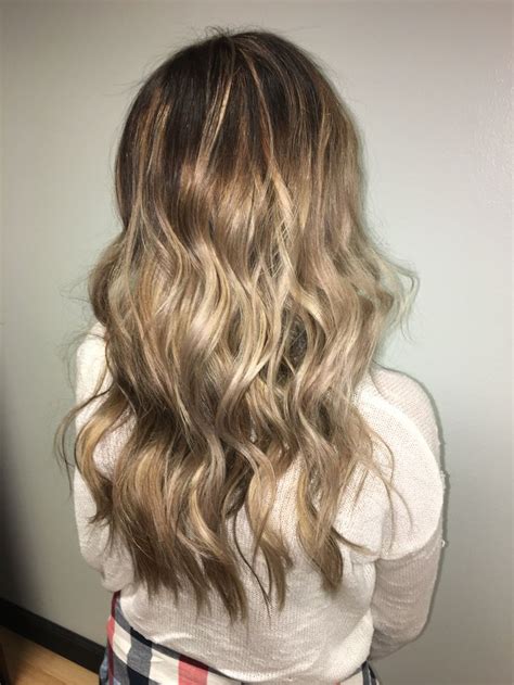 Add some sun to dark chestnut brown with warm golden caramel color placed mainly on the ends, venturing higher in a few random spots to make it look natural. Sun kissed brunette | Hair styles, Long hair styles, Beauty