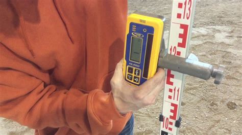 Identify the initial height of your grade. How To Use A Laser Level - YouTube