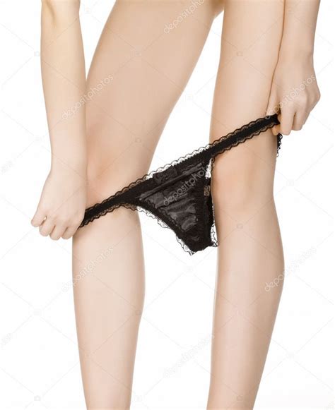 I refuse to wear underwear. Woman takes off her panties — Stock Photo © Nobilior #4888775