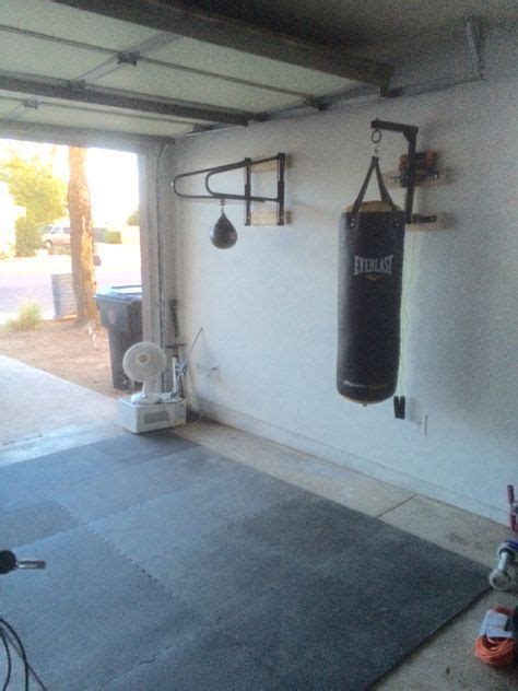 I am trying to figure out how to hang my heavy bag on my finished basement ceiling. How To Install Punching Bag In Basement | Openbasement