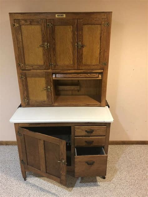 Explore kitchen remodel & repair. Antique Oak Hoosier Cabinet. Has roll up tambour door. It is in good condition not perfect, has ...