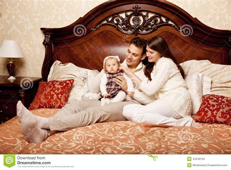 794 mother & son bad romance. Cute Family In The Bedroom. Mother, Father And Daughter In ...