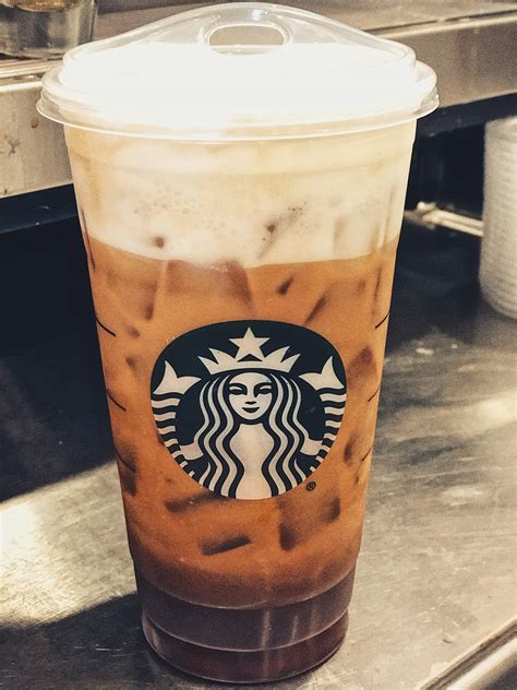 Starbucks cold brew coffee, 155 mg caffeine/12 fl oz. iced cold foam cap with almond milk, layered goodness ...