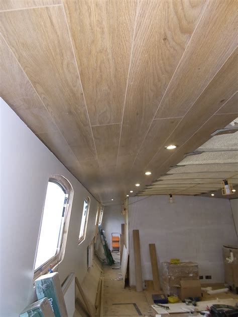 Adding a recessed light above the shower provides welcome illumination while showering. Widebeam Boat Build Blog: Ceiling & Lighting