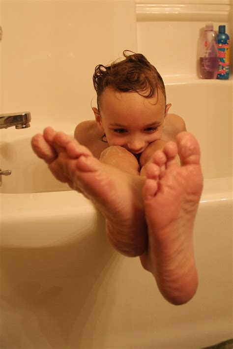 Getting a baby used to the sensation of bathing can be done by trying a sponge bath. Wrinkled Feet After Bath | Rene Smits | Flickr