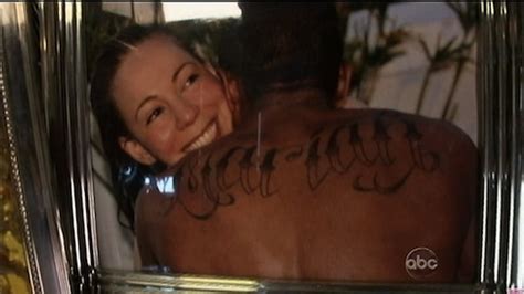 As celebs are known to do, nick took off his shirt at one point and it's hard to make out the details from the photo, but our nick sources say the tattoo shows jesus on the cross with angel wings coming off the end the cross. Nick Cannon Covers Up Mariah tattoo + Mariah Carey ...