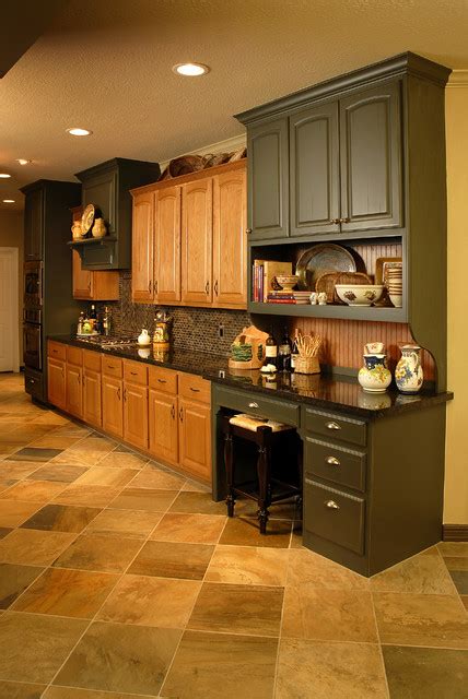 The more colours and metal finishes you add, the more cluttered it can make the room look. Kitchen Remodel using existing oak cabinets - Traditional ...