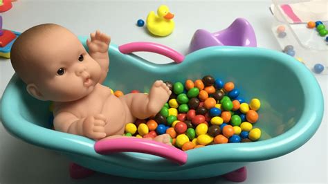 American baby doll bath routine in cute little pink bathtub kids video. Baby Doll Bath In Candy Pretend Play - YouTube