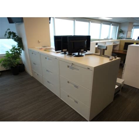 Light grey, black, putty, white stock status: Bank of 6 Global 3 Drawer Lateral File Cabinets w Laminate ...