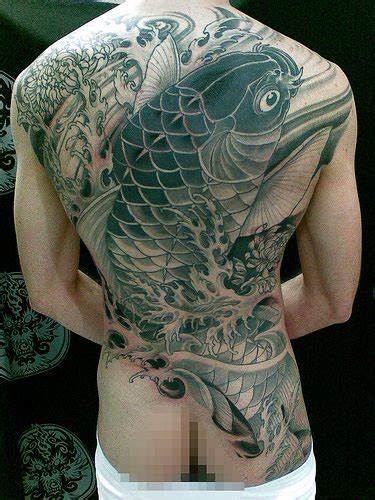 Tribal tattoos often mean courage or strength. Tattoo Rea Reo: Japanese Koi Fish Tribal Tattoo Design 01