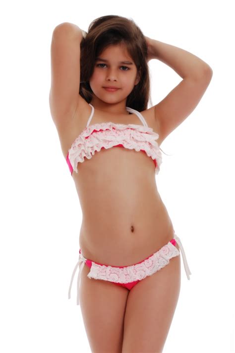 It is because it appears like a camel toe. Kids Bikini Swimsuit bando ruffles bottoms with ties 1115